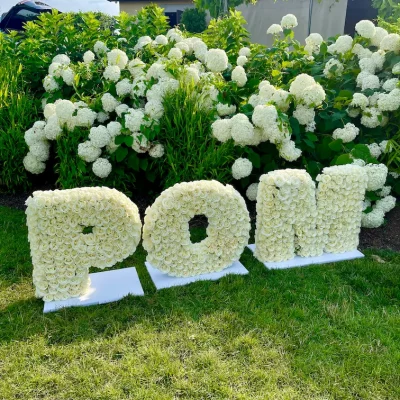 Three-foot standing floral letter with vibrant white blooms