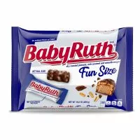 Close-up of a Baby Ruth bar, revealing its nougat center, topped with caramel, peanuts, and covered in milk chocolate.