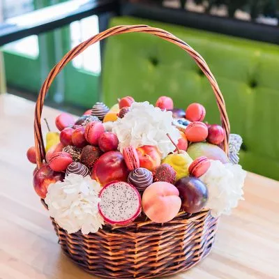 Luxe Fruit and Bloom Basket NYC featuring fresh fruits and flowers by WOW Bouquet.