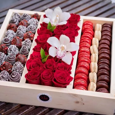 Mouthwatering chocolate-covered strawberries and macarons.