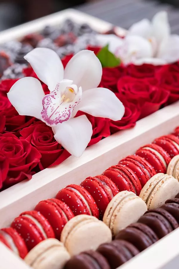 Decadent treats: chocolate strawberries and macarons.