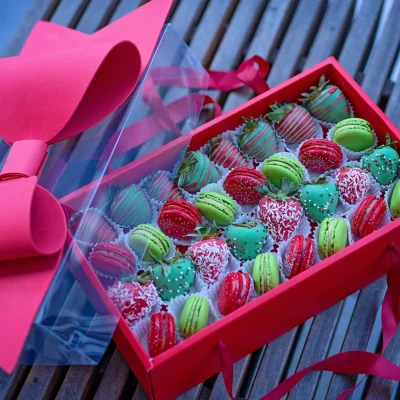 Elegant Holly Jolly Strawberry-Macaron Fusion box, filled with chocolate-covered strawberries and colorful macarons
