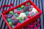 Winter Wonderland Box with chocolate-covered strawberries and macarons, embodying NYC's Christmas spirit.
