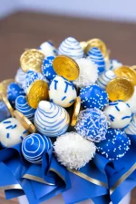 Elegant Hannukkah bouquet featuring blue chocolate-covered strawberries.