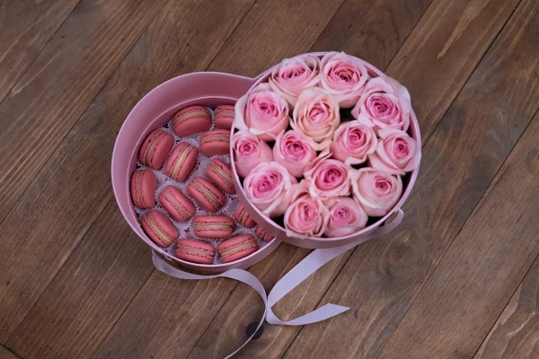 Top view of Pink Rose-Macaron Round Box showcasing the arrangement of pink roses and colorful macarons