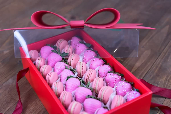 Romantic pink strawberries and macarons gift set.